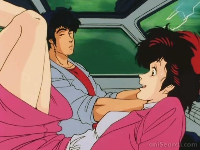 City Hunter and it's many amazing adaptions 30 A comedic anime scene featuring Ryo Saeba and a female character in a vehicle, reflecting the signature humor translated into animated City Hunter adaptions.