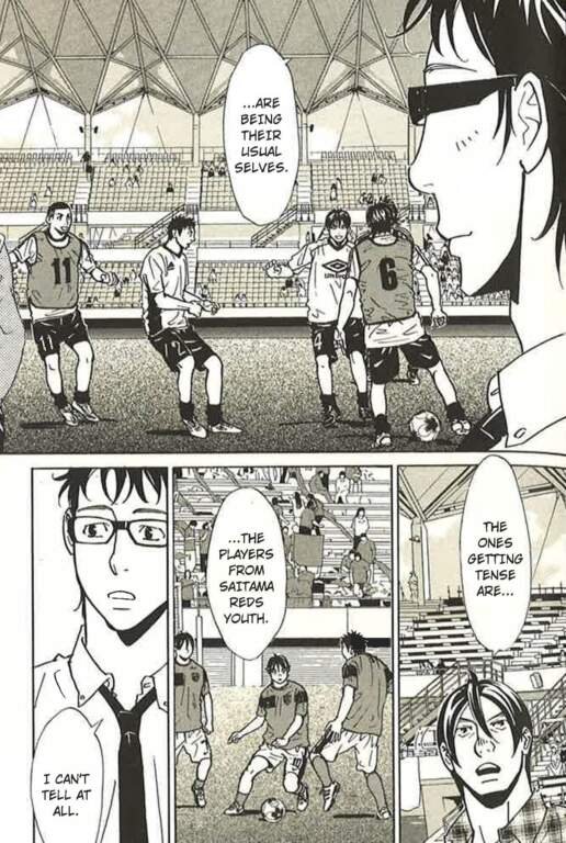 Read World Cup Football Manga To Keep The Excitement Going 16 "Football Nation manga page: players warm up on the pitch under a stadium roof as narration notes they're being their usual selves, while a boy in glasses observes closely. Lower panels reveal the players are from Saitama Reds Youth, with the boy in glasses saying he can't tell who's tense, as another player watches the stands with a worried expression."