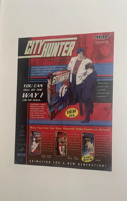 City Hunter and it's many amazing adaptions 36 A retro print advertisement from ADV Films promoting the VHS and DVD release of "City Hunter: The Motion Picture," representing the western home video era of animated City Hunter adaptions.